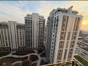 a view of tall buildings in a city at ЖК Ұлы Дала in Shymkent