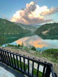 a view of a lake with mountains in the background at Camping Temali T&M in Arrëz