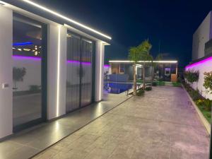 an empty patio of a house at night at Aurora villa in Rrushkull