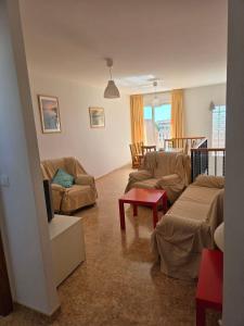 a living room with two couches and a tv at Durino apartment with terrace in Moncófar