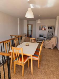 a dining room with a table and chairs at Durino apartment with terrace in Moncófar