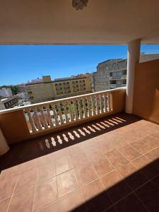 a balcony with a view of a city at Durino apartment with terrace in Moncófar