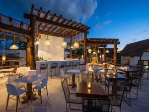 Restaurant o un lloc per menjar a Villas HM Palapas del Mar