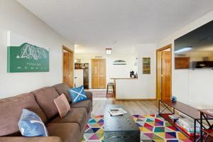 a living room with a couch and a table at Angelhaus #213 in Durango
