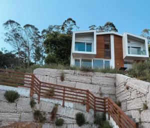a house on top of some retaining walls at Casa Broullón in Moaña