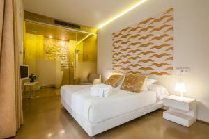 Posteľ alebo postele v izbe v ubytovaní Hotel Viento10
