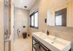 a bathroom with a sink and a mirror and a shower at The Blue Mirage in Tangier +18 photos