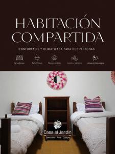a website for a haciotechnology company with two beds at Casa El Jardín Centro Histórico in Asunción