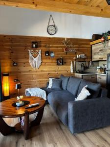 a living room with a couch and a table at Meris in Ulcinj