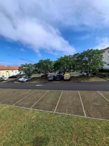 a view of a parking lot with cars parked at Horta Joy! in Horta