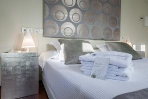 Posteľ alebo postele v izbe v ubytovaní Hotel Viento10
