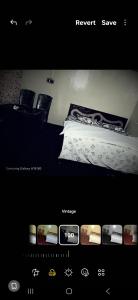 a picture of a bedroom with a bed in a room at Hotel New Green View a part in Srinagar