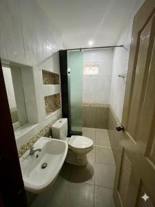 a bathroom with a toilet and a sink and a shower at BP Private Home in Ban Nong Sa +12 photos