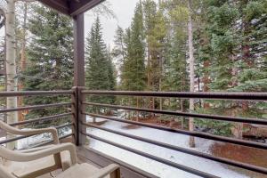 a screened in porch with a view of trees at Autumn Foliage 209 in Breckenridge