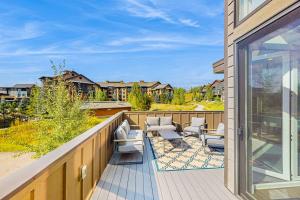 a balcony with chairs and a view of a yard at Flat Tops 2510 in Steamboat Springs