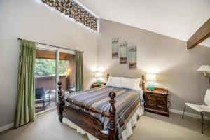 a bedroom with a bed and a window at Sugar Run: 25 in Sugarbush Village +39 photos