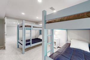 a bedroom with two bunk beds in a room at Woodlands At Loon in Lincoln +62 photos