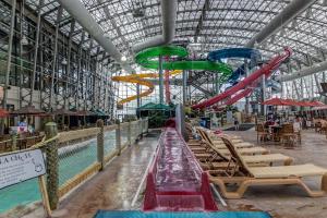 a large water park with a water slide at The Jay Chalet in Jay