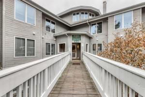 a house with a walkway leading to the front door at Vermont Paradise in Warren