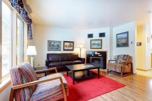 a living room with a couch and a table at 515 Cache in Jackson