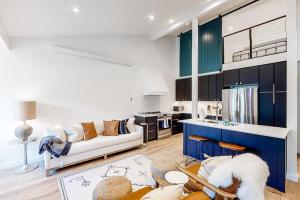 a living room with a couch and a table at Fish Creek Point in Wilson
