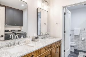 a bathroom with a sink and a stove at Fish Creek Point in Wilson +36 photos