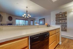a kitchen with a counter and a dishwasher at 2502 Pitchfork in Jackson +51 photos