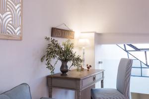 A seating area at Mediterraneo Suite Home
