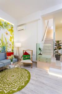 A seating area at Mediterraneo Suite Home