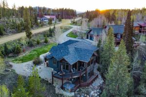 an aerial view of a house with a blue roof at Hilltop Palace in Fraser
