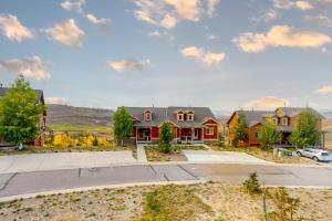 an aerial view of a house with a driveway at Summit Point Place in Granby