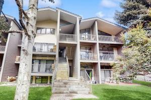 an apartment building with stairs in front of it at Beaver Creek West 22 in Avon