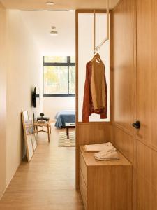 a room with a closet and a bedroom at Alma House in Singapore +33 photos