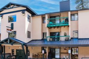 a building with two balconies on top of it at Angelhaus #300 in Durango Mountain Resort