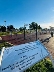 a sign in front of a basketball park at Holiday House Zaton in Zaton +64 photos