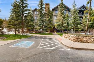 an empty parking lot in front of a large house at Mountain Thunder 5202 in Breckenridge