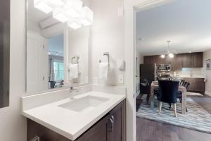 a kitchen with a sink and a dining room at Mountain Getaway in Crested Butte +38 photos