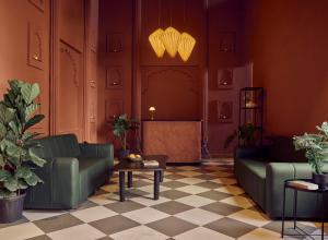 a living room with two couches and a table at Minimalist - Lake Pichola Edit in Udaipur +73 photos