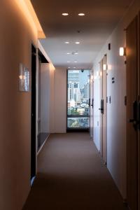 Телевизия и/или развлекателен център в Hotel LETS Above
