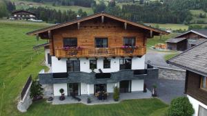 an aerial view of a house with a balcony at Appartement Steger in Mittersill