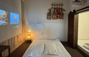 a bedroom with a bed and a lamp in it at Damyang Hwayang in Damyang +14 photos