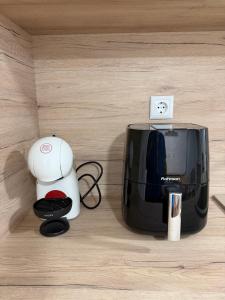 a toaster and a blender sitting on top of a counter at Boho style house Varna in Varna City