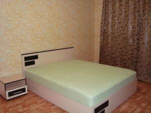 Un ou plusieurs lits dans un hébergement de l'établissement Планерная 73