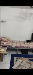 a bunk bed on a shelf in a room at Living room in Muscat