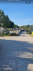 an empty road with a bridge in the distance at Chalet in Tourrettes