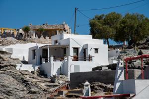 a white house on top of a mountain at Aegean Whisper Koumelas in Mamádhos +33 photos