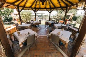 an overhead view of a restaurant with tables and chairs at Agriturismo La Baita in Agerola