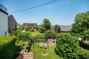 an aerial view of a yard with a swing at Haus Mersche in Gösenroth