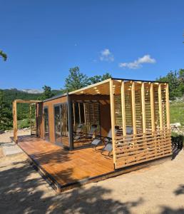 a house that is being built on a wooden deck at Piva Chill in Plužine +16 photos