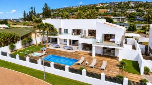 an aerial view of a house with a swimming pool at Vetho House Villa Ballito in Ballito
